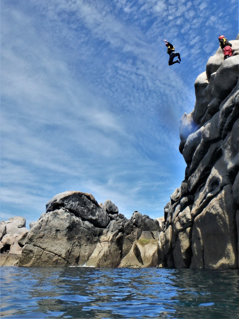 Amazing cliff jump coasteering at Peninnis Head on Isles of Scilly