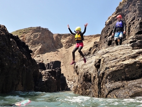 Coasteering on a beginner coasteering trip at Praa Sands, Cornwall