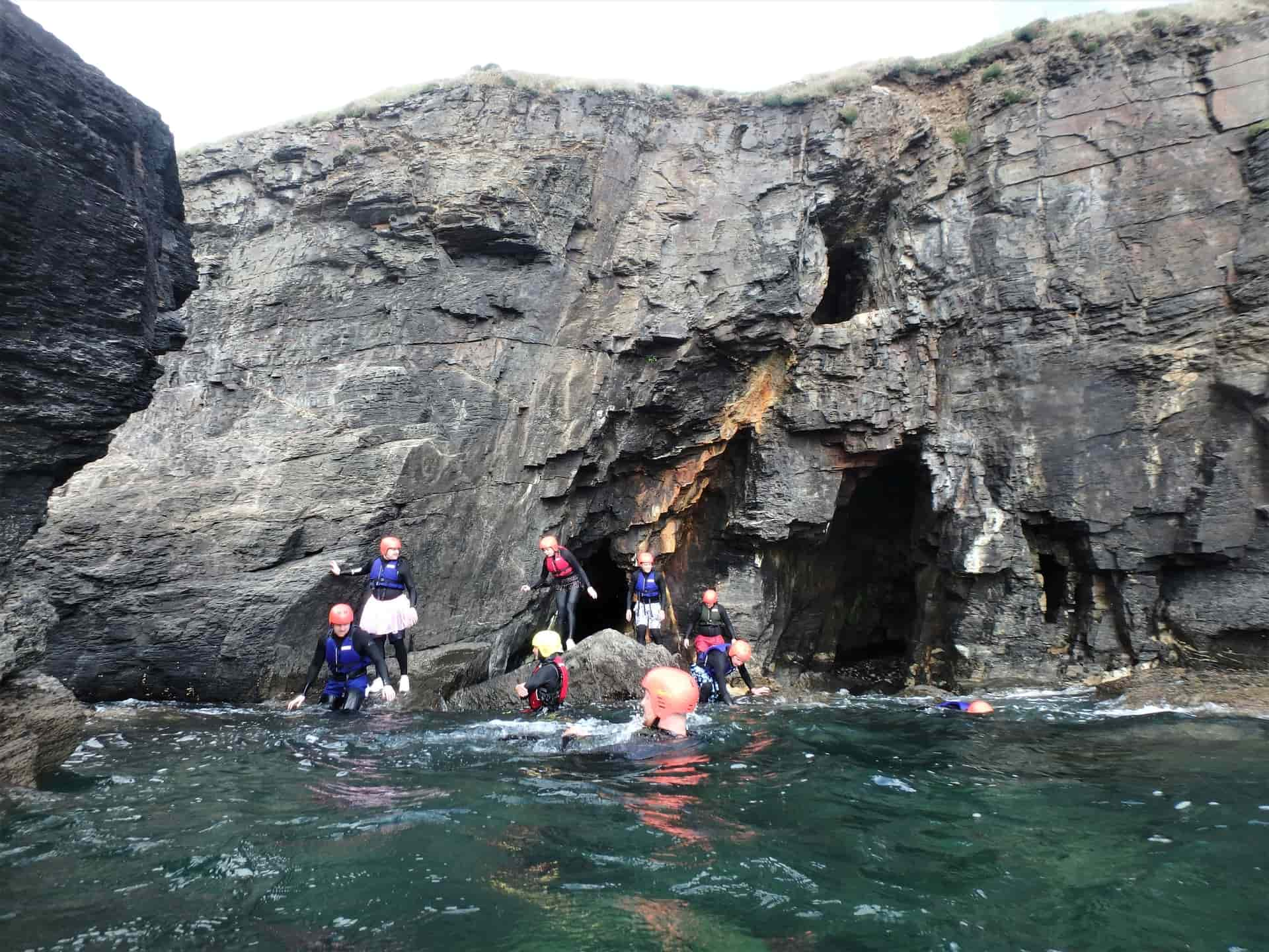 Coasteering at Praa Sands under an old Cornish mine. Coasteering with Cornish history with Kernow Coasteering