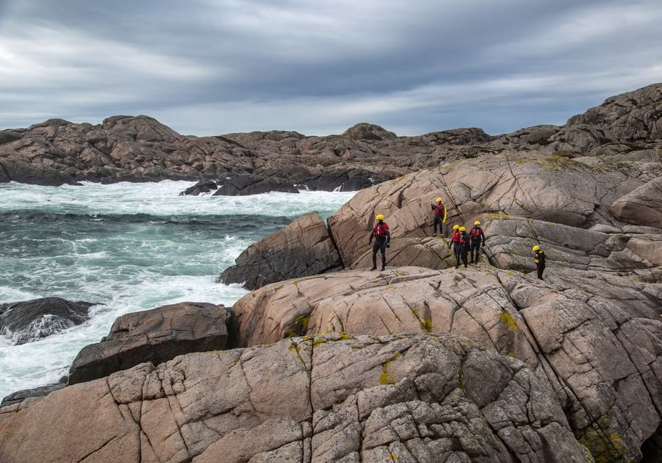 Traversing an amazing barren landscape coasteering in Norway