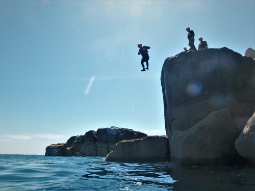 cliff jump at Peninnis Head coasteering on the Isles of Scilly with Kernow Coasteering. Peninnis Outer Head, Big Jolly Rock, Pip