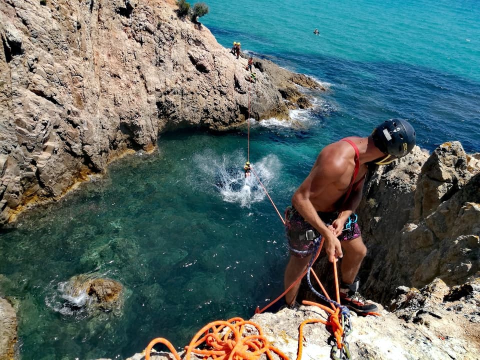 Tyrolean traverse coasteering with Sardinia Wild Canyoning