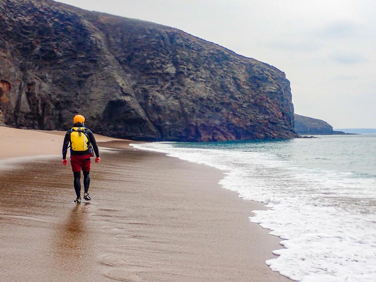 Coasteering at Nicholls' Cove near Porthleven, Cornwall.