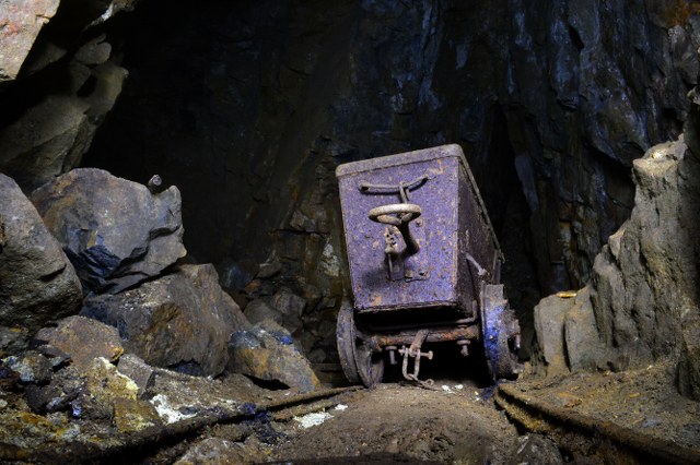 MIne exploration and caving trips now available in Cornwall. Here mine explorers discover an abandoned ore cart in a tine mine