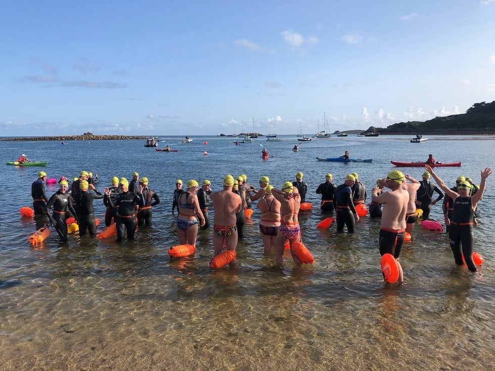 Crowd taking part in the Scilly Swim Challenge.