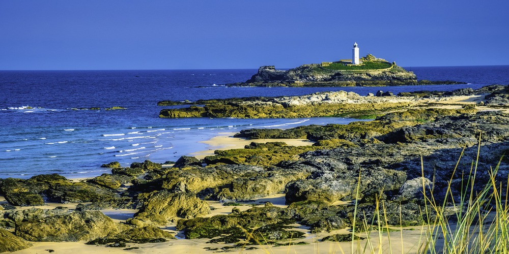 Godrevy Lighthouse, at the far end of St. Ives Bay