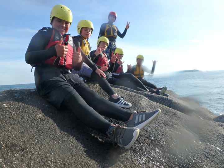 Group coasteering at Peninnis Head, Isles of Scilly with Kernow Coasteering, Cornwall and Scilly's best coasteering/