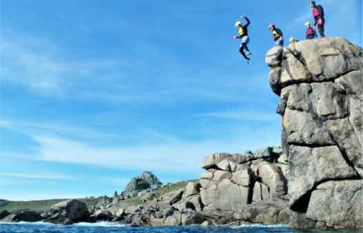 Big cliff jump coasteering in Cornwall and the Isles of Scilly. Here's one at Peninnis Head, St. Mary's