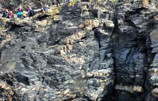 Large cliff jump at Praa Sands, cornwall, on a trip with Kernow Coasteering