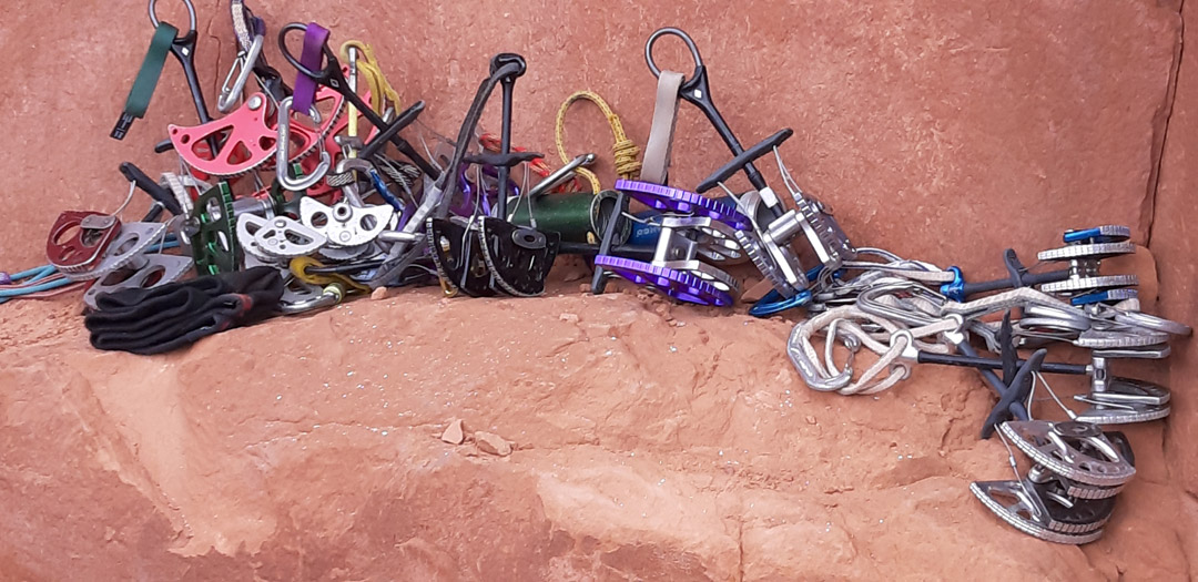 Large trad climbing gear including cams and Big Bros for off-width crack protection