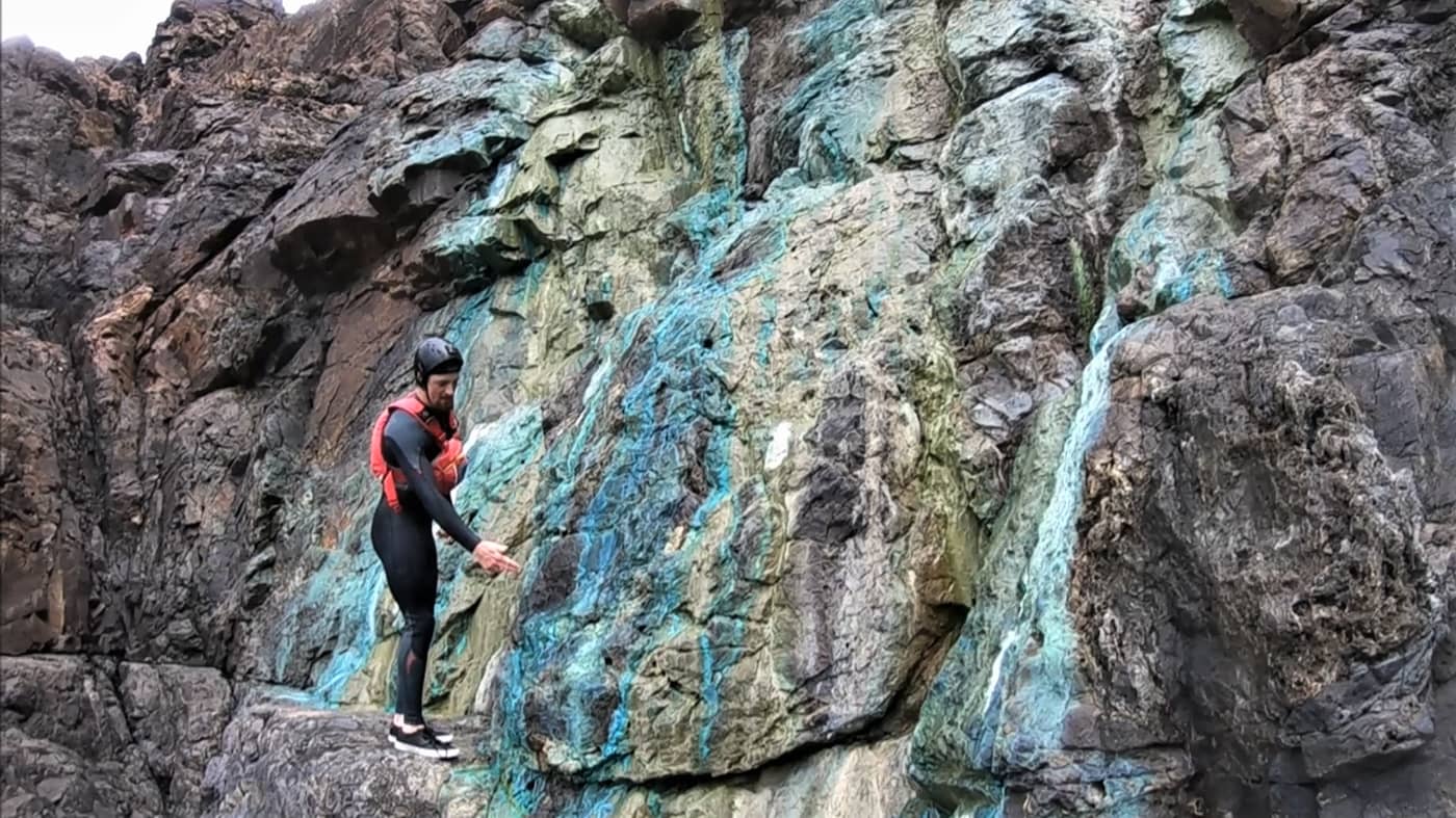 Brightly coloured mineral formations on the cliffs between St Ives and Penzance, discovered while coasteering along the Cornish coast.
