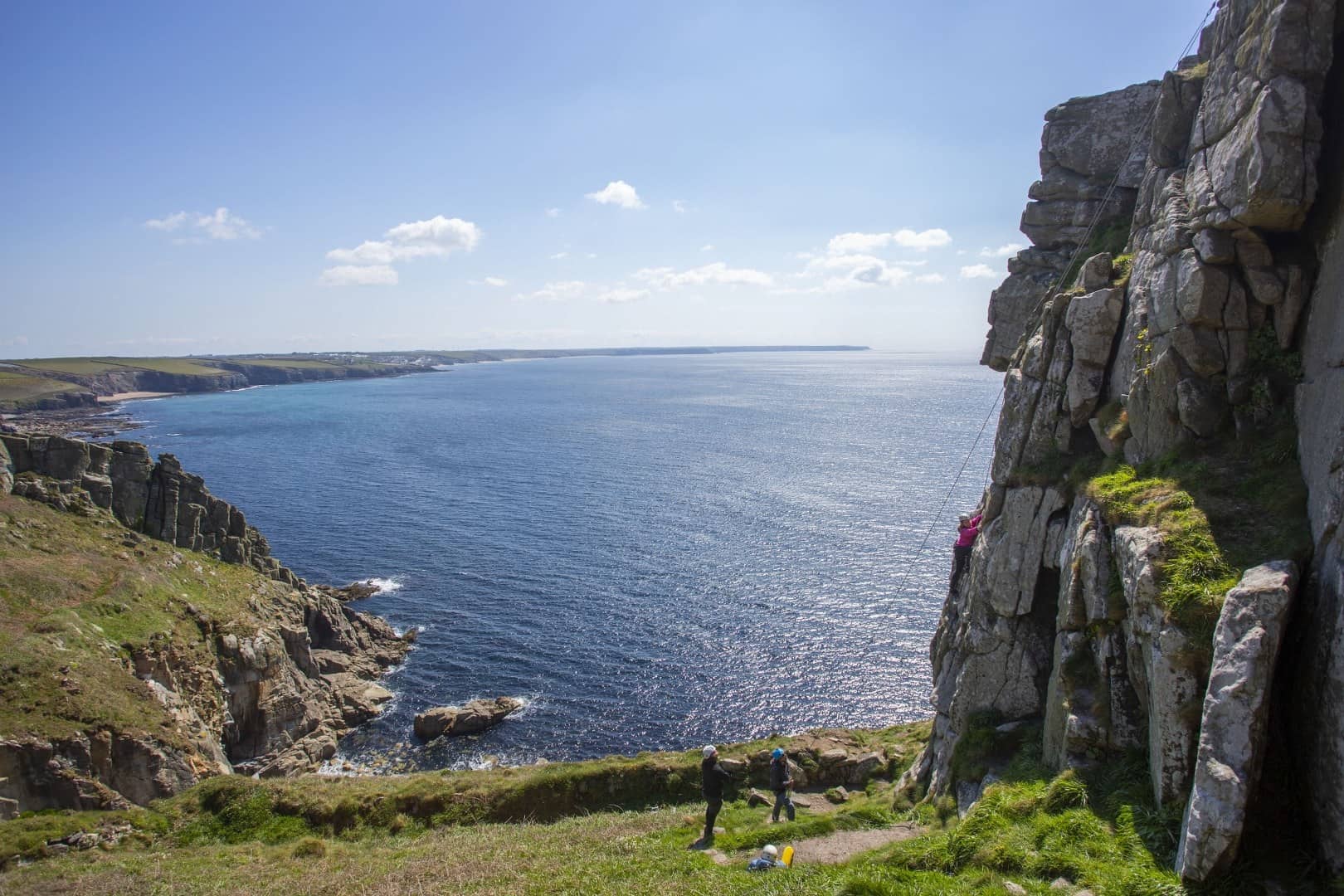 Rock climbers on sea cliffs at Trewavas Head near Praa Sands