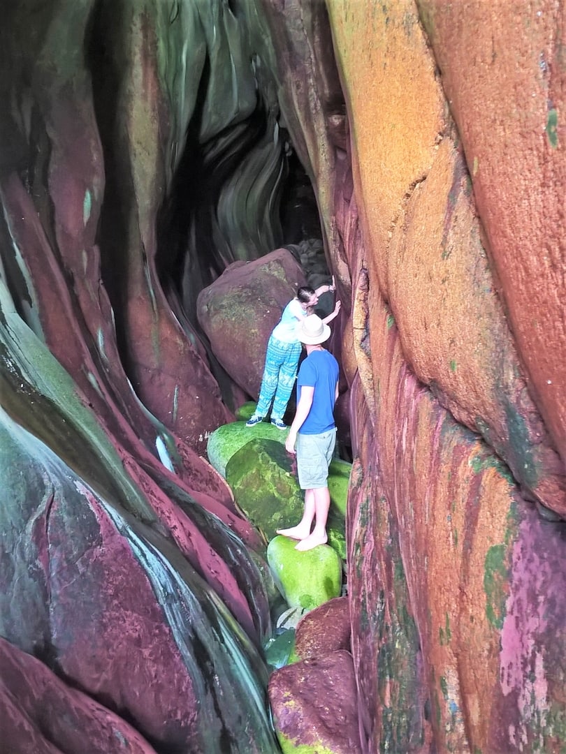 Sunlight shining into the Cave of Many Colours at Cape Cornwall, one of the most vibrant sea caves in Cornwall.