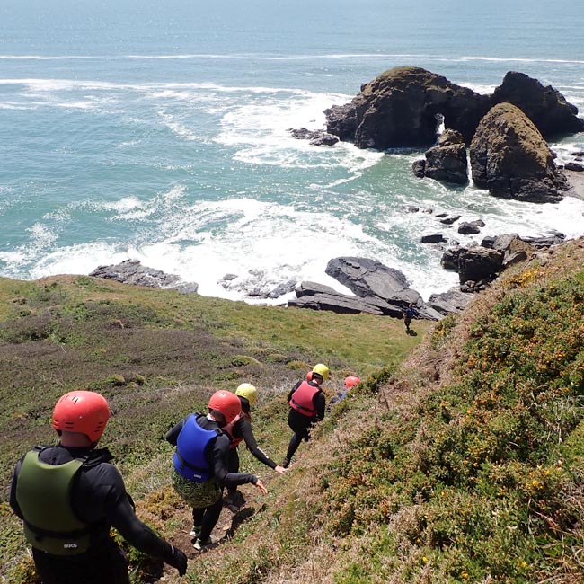 Guided group beginning a coastal adventure in west Cornwall.