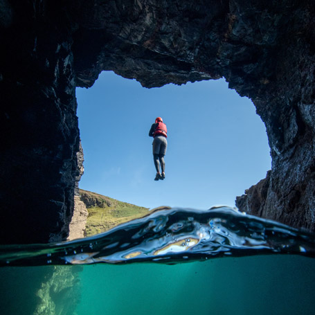 Penzance things to do, including cliff jumping during a coasteering adventure with Kernow Coasteering