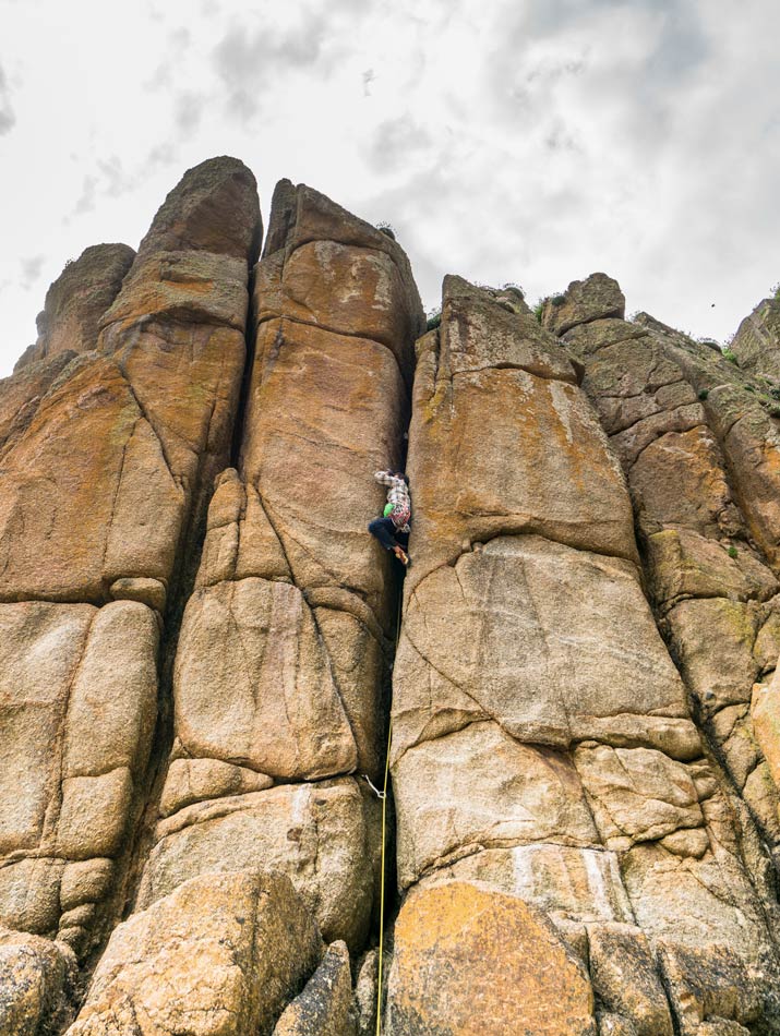 Lead climbing at Porthcurno in Cornwall