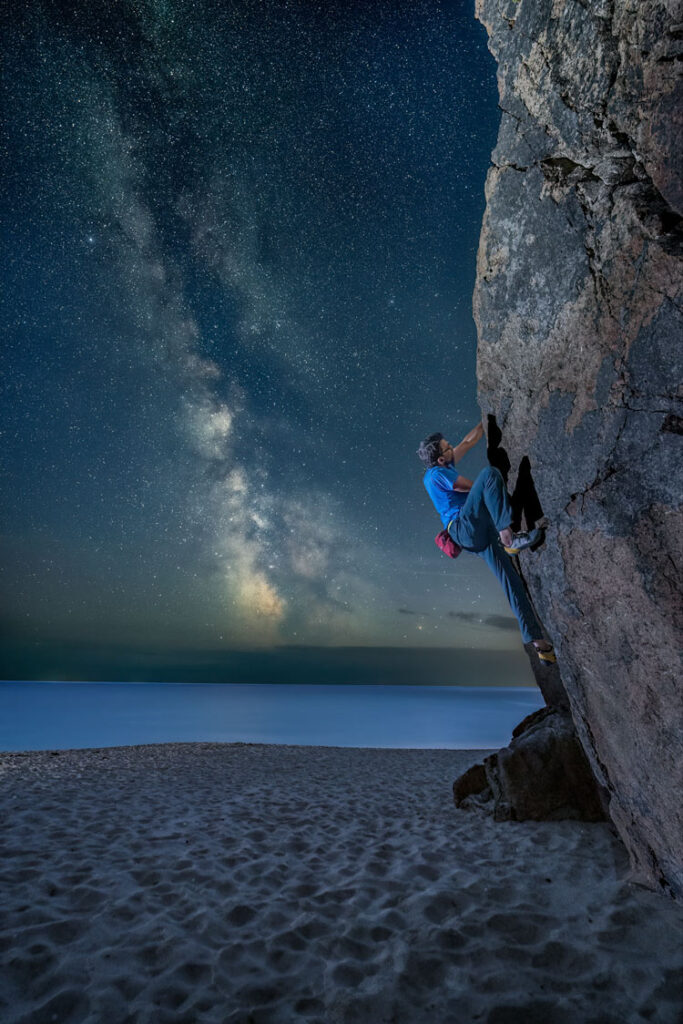 Bouldering on Pednvounder Beach under the Milky Way – composite image by Kernow Coasteering founder, Matt